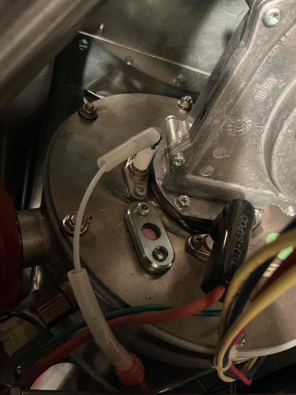 Responded to no hot water complaint on NTI boiler system. Found Error 67 code indicating ILK switch failure to close, caused by tripped low water cutoff with system pressure at 10 psi. Refilled boiler to proper operating pressure of 20 psi, restoring system function. Unit fired successfully and resumed heating domestic hot water tank. Verified condensate trap drainage operating correctly and confirmed exhaust pathway clear of obstructions. Inspected all accessible piping for leaks with no issues found. Confirmed safe operation of all system components including circulation pumps, gas valve assembly, and safety controls. System restored to full operational status.