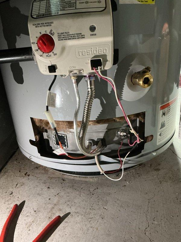 Responded to service call for Resideo brand water heater with gas control system malfunction. Replaced defective gas valve under manufacturer part warranty, including associated labor, shipping, and warranty documentation processing. Additionally replaced thermopile to ensure proper millivolt generation for gas valve operation. Removed lower access panel to access internal components, disconnected existing gas valve assembly and thermopile connections, installed new manufacturer-approved replacement parts, and restored all electrical and gas connections. Verified proper pilot ignition, flame sensing, and temperature control operation upon completion. Unit restored to full operational status with all safety systems functioning correctly.