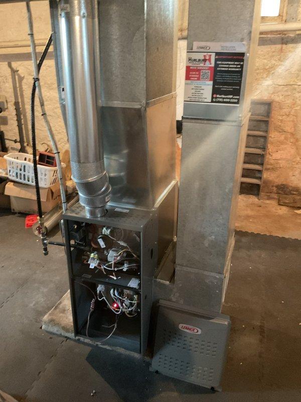 Responded to service call for nine-month-old Lennox furnace experiencing intermittent blower fan activation and fault codes. Upon arrival, found active error codes 240 and 241 indicating flame sense without heat call. Performed comprehensive diagnostic inspection of furnace operation, electrical connections, and control board functionality. Ran multiple heating cycles to replicate reported issue but system operated within normal parameters during testing. Cleared all fault codes from system memory. Assessed potential causes including voltage fluctuations, power surges, or brownout conditions that may have triggered false error codes. All wiring connections verified secure, flame sensor inspected and found clean with proper positioning. Control board operation monitored throughout diagnostic process. System left in operational condition with recommendation to monitor for code recurrence. If error codes 240/241 reappear, control board replacement will be necessary under warranty coverage