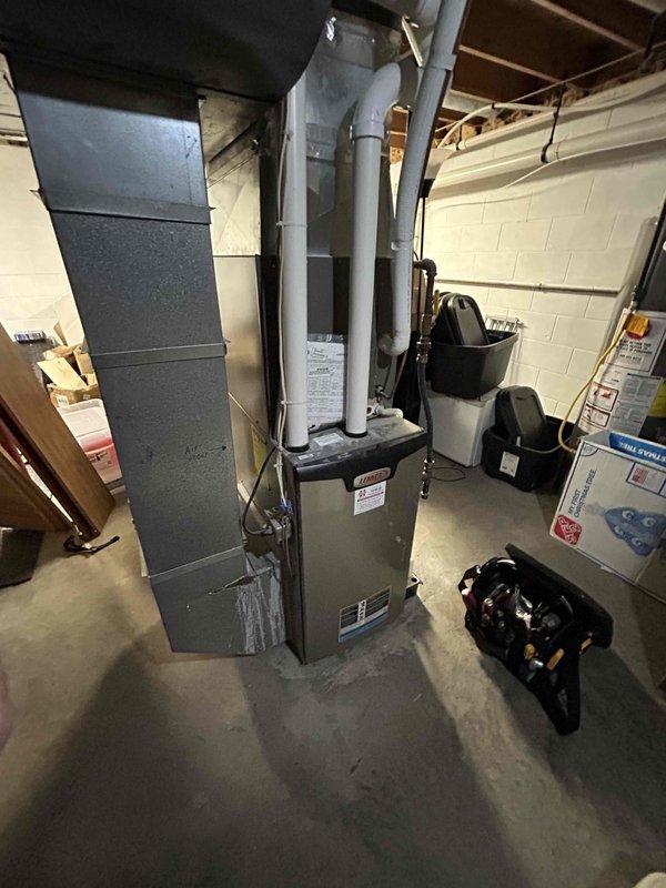 Completed comprehensive furnace tune-up on 6-year-old unit per standard maintenance protocol. Inspection revealed secondary heat exchanger with dirt accumulation requiring cleaning to maintain optimal efficiency and safe operation. Documented equipment condition with photos and recommended cleaning service to prevent potential performance issues.