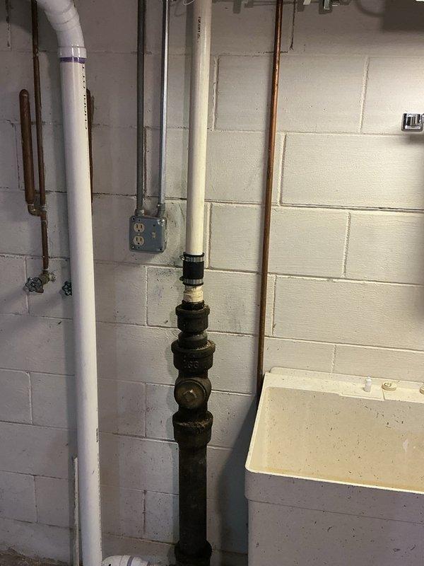 Responded to basement floor drain backup issue. Upon inspection, discovered grease blockage in main line just past the first deck and floor drain. Successfully cleared obstruction using medium rigid snake machine. Drain restored to proper flow and functionality.