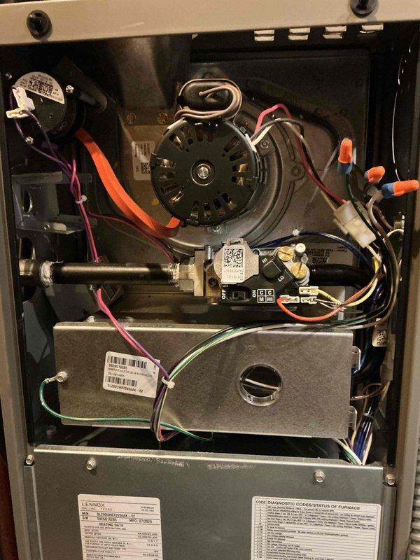 Responded to warranty call for one-month-old Lennox AC system experiencing loud banging noises during startup and shutdown cycles. Upon inspection, determined that the new furnace blower motor was operating at significantly higher speed than previous unit, creating negative pressure that caused ductwork to flex and produce metal warping sounds. Ductwork location prevented installation of physical bracing. Accessed furnace cabinet and adjusted blower motor speed settings to appropriate level for AC system capacity, eliminating excessive airflow that caused ductwork distortion. Tested system operation through multiple cooling cycles to verify noise reduction and proper AC performance before departure.