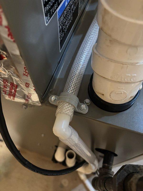 Completed HVAC install callback to address air sealing and hardware issues. Replaced broken furnace door clip with new latch to ensure proper cabinet closure. Sealed gaps around A-coil box and connected ductwork to eliminate air leakage. Installed hold-down clamp on AC condensate drain hose to secure drain line and prevent disconnection.