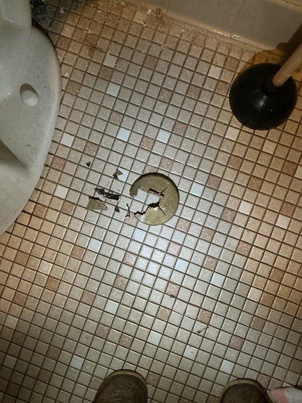 Responded to water backup issue affecting two toilets that were not flushing properly due to accumulation of toilet paper and debris in the main sewer line. Performed main line cleanout, conducted camera inspection to assess line condition, removed and reset one toilet to access the drain system, and ground out the deteriorated cleanout plug before installing a new plug to ensure proper future access for maintenance.