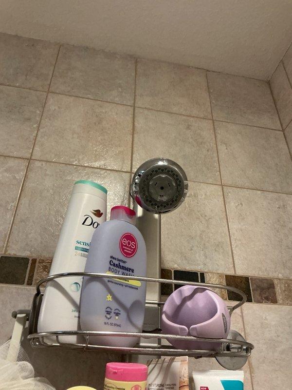 Responded to service call for two malfunctioning Kohler toilets in residence. Diagnosed and repaired leak on basement toilet caused by improperly secured tank-to-bowl bolt that was less than hand tight; tightened bolt to proper torque specification to eliminate leak. Inspected upstairs toilet with continuous running water issue and determined flush valve had failed and reached end of service life; noted significant sediment accumulation in tank affecting performance. Replaced defective flush valve assembly on upstairs toilet and restored proper fill and flush operation. Provided estimate for whole house water filtration system to address sediment concerns and prevent future component degradation.
