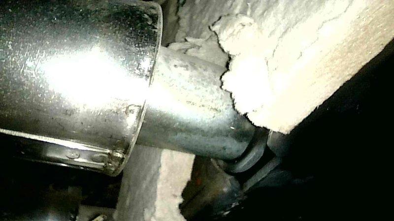 Responded to no heat call for 1998 Buderus boiler. Upon inspection, found refractory material deteriorated and falling apart, causing impingement on the burner assembly. The rollout switch was also compromised and removed. Due to the age and specialized nature of this Buderus unit, proper OEM replacement parts are required for safe repair. Submitted parts request for pricing on refractory and rollout switch components. System remains non-operational pending parts availability, and replacement boiler options are being evaluated given the unit's age and parts availability concerns.