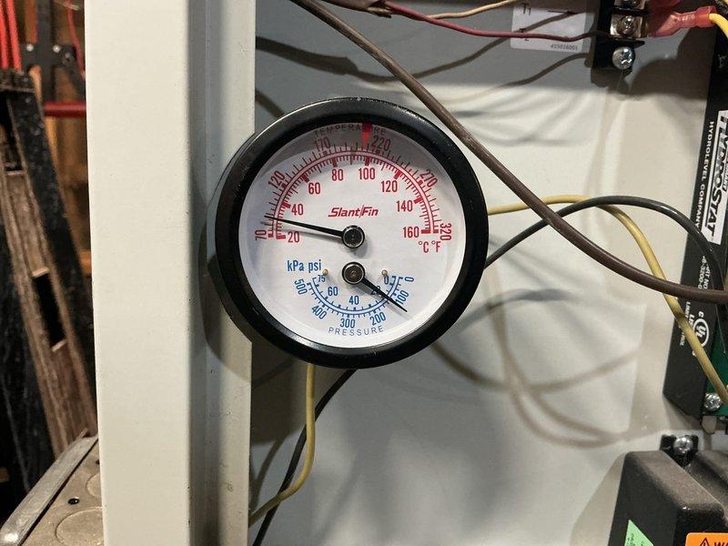 Completed routine maintenance on 8-year-old boiler as part of heating system maintenance agreement. Performed comprehensive tune-up including testing all components, verifying water temperature and pressure, checking gas pressure, and measuring carbon monoxide levels in flue—all testing within acceptable specifications. However, detected carbon monoxide spillage of 4-6 ppm leaking from bottom right side of heat exchanger, which while below the maximum allowable spillage threshold of 9 ppm, indicates compromised heat exchanger integrity. Boiler remains operational but recommend boiler replacement due to CO leakage, as any carbon monoxide escaping outside the sealed combustion chamber represents a safety concern and system degradation.