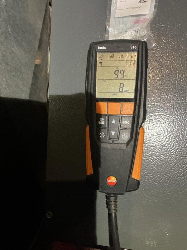 Completed annual heating and cooling maintenance on two furnace systems and two AC units. Performed comprehensive furnace inspection including flame sensor cleaning, heat exchanger examination with no cracks or holes detected, wiring inspection, and testing of inducer motors and blower motors. CO levels tested within safe parameters on both systems. Noted air filters require replacement on both units. On cooling systems, inspected wiring, contactors, and refrigerant levels with all readings nominal. Identified failing run capacitor on larger outdoor unit reading 39µF out of rated 45µF; obtained approval and replaced capacitor. Verified cooling performance with 11-degree delta-T despite marginal outdoor ambient conditions of 60°F. All systems operational and ready for seasonal use.