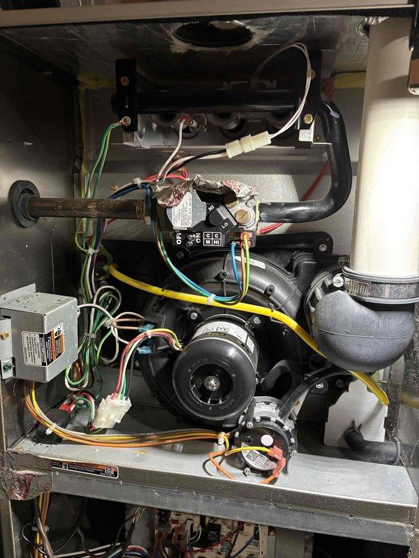 Completed comprehensive furnace tune-up and maintenance on a 12-year-old heating system. Performed full system inspection including thermostat verification, indoor air handler assessment, and evaluation of all critical components. Checked air filter condition, condensate drain operation, blower motor performance, inducer motor function, capacitor integrity, and electrical wiring connections—all found to be in satisfactory condition. Verified proper temperature split across the system. Conducted thorough examination of furnace heat exchanger for cracks or deterioration, tested igniter operation, inspected flame sensor for proper function, and measured gas pressure to ensure proper fuel delivery—all components operating within manufacturer specifications. System is functioning normally with no deficiencies noted at time of service completion. Homeowner enrolled in preventative maintenance membership program for ongoing system care.