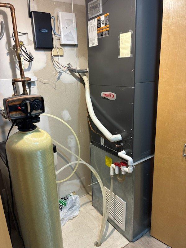 Responded to no heat/no cool call on 6-year-old Lennox heat pump system with iComfort S30 thermostat showing no power. Diagnosed complete thermostat failure and failed S30 control box preventing system operation. Replaced both the wall-mounted iComfort thermostat and S30 control module. Restored power to thermostat, verified proper communication between components, and confirmed heat pump system returned to normal heating and cooling operation.