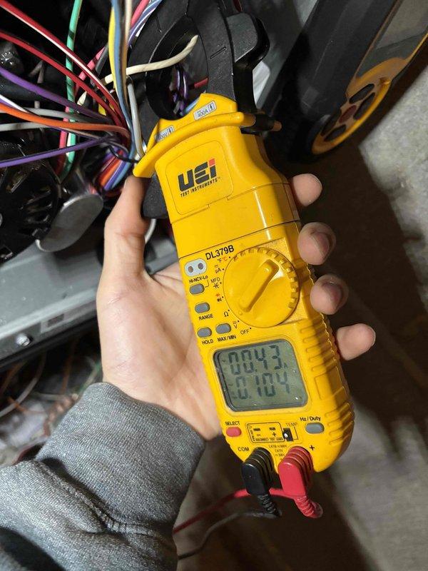 Completed annual furnace maintenance on 5-year-old system including comprehensive inspection of thermostat, filter, drain, blower motor, inducer motor, capacitor, electrical wiring, heat exchanger, igniter, flame sensor, and temperature split. Readjusted gas pressure to manufacturer specifications and corrected 2-stage heating operation by adjusting dip switch settings for proper low-stage to high-stage transition after 10 minutes. Addressed rust buildup around condensation trap area by flushing and draining trap, and noted minor burner buildup within acceptable operating parameters. System tested and confirmed operating normally upon completion.
