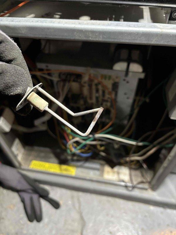 Performed second opinion inspection and maintenance on 13-year-old furnace system. Verified heat exchanger showing significant deterioration with rust and temperature stress damage requiring attention. Identified blower motor capacitor reading out of manufacturer specifications. Conducted combustion analysis confirming proper burner operation and gas combustion efficiency within acceptable parameters. Inspected and verified operational status of thermostat, air filter, condensate drain, blower motor, inducer motor, and electrical wiring connections. Measured temperature split across heat exchanger within normal range. Discussed findings and replacement options with homeowner and scheduled service advisor consultation for system replacement recommendations.