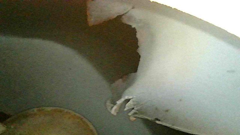 Responded to service call for furnace not heating on 15-year-old system. Upon inspection, found pilot light extinguished and successfully re-lit. Tested furnace operation and confirmed heating functionality restored. Conducted thorough inspection of heat exchanger due to age of unit and discovered heat exchanger baffle had rusted completely off and was resting dangerously close to burner assembly, creating an unsafe operating condition. Documented findings with photographs showing deteriorated components and damage. Explained safety concerns to homeowner regarding failed heat exchanger baffle and potential carbon monoxide hazards. Coordinated with service advisor for replacement system quote due to severity of heat exchanger failure and age of equipment making repair inadvisable.