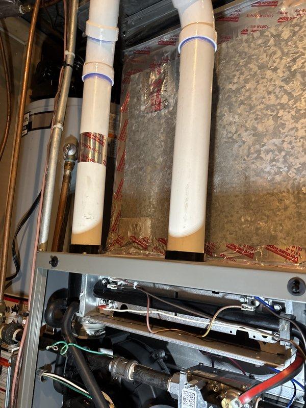 Completed scheduled maintenance agreement heating visit on a 2-year-old residential HVAC system consisting of one furnace and one humidifier. Performed comprehensive inspection of thermostat operation, air filter condition, condensate drain, blower motor, inducer motor, capacitor, and all electrical wiring connections—all components found in satisfactory condition. Evaluated temperature split across the system and confirmed proper performance parameters. Conducted thorough examination of furnace heat exchanger for cracks or deterioration, tested igniter and flame sensor functionality, and measured gas pressure at manifold. Adjusted gas pressure to manufacturer specifications to ensure optimal combustion efficiency and safe operation. Inspected humidifier operation, verified water panel condition, and confirmed proper drainage function. Homeowner supplied replacement water panel for installation during service visit. All systems tested and verified to be operating within normal paramete