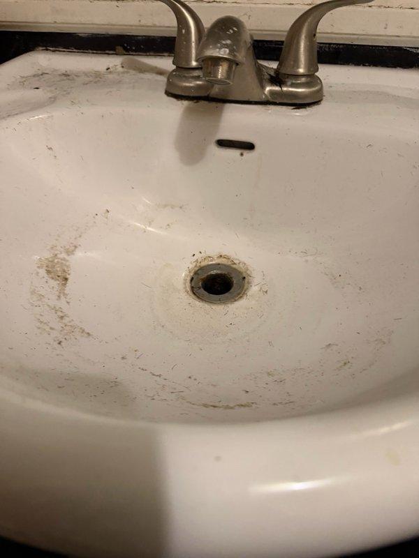 Responded to service call for clogged bathroom sink drain in basement. Successfully cleared obstruction by running plumbing snake through drain line, restoring proper water flow and drainage function.