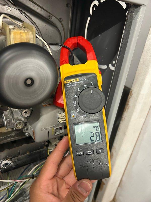 Completed comprehensive furnace tune-up and seasonal maintenance inspection under rewards club membership. Performed thorough system evaluation including flame sensor cleaning, blower wheel inspection, air filtration assessment, inducer motor examination, gas valve inspection, and heat exchanger scope analysis. Conducted combustion analysis confirming 82.4% system efficiency with safe carbon monoxide levels, verified proper gas pressure, measured inducer motor amp draw, and tested flame sensor microamp readings. All components found operating within normal parameters with no defects identified. Recommended regular filter replacement and continued scheduled maintenance to ensure optimal furnace performance.