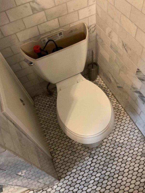 Responded to service call for toilet repair in upstairs bathroom where closet bolts had broken during previous maintenance attempt. Performed complete toilet pull and reset procedure, replacing failed closet bolts with new hardware to secure fixture properly to flange. Assessed upstairs bathroom sink faucet leak that occurred after attempted replacement by occupant; identified potential need for new shut-off valves to complete faucet installation correctly. Toilet successfully reinstalled and secured with new mounting bolts, restoring proper function and stability to fixture.
