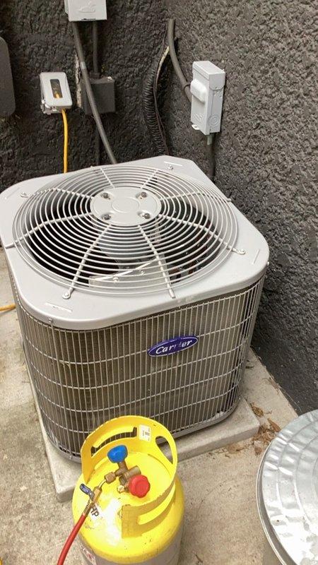 Responded to service call for non-functional Carrier air conditioning system. Diagnosed failed compressor on outdoor condenser unit. Removed defective compressor and installed new replacement unit. Properly recovered refrigerant using recovery equipment, replaced compressor assembly, evacuated system, and recharged to manufacturer specifications. Tested system operation and verified proper cooling performance upon completion.