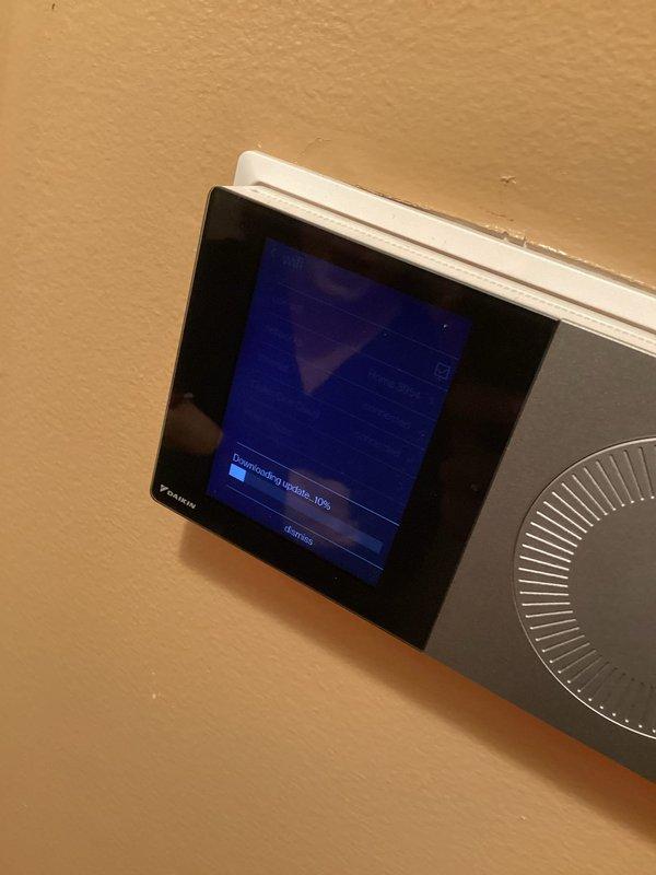 Responded to service call for heating system unable to maintain temperature below 77°F and Daikin thermostat experiencing screen freezing, slow response, and Wi-Fi connectivity issues. Performed complete thermostat reboot, established internet connection, and successfully downloaded and installed firmware update to resolve performance issues. System restored to proper operation with thermostat now responsive and connected to network.