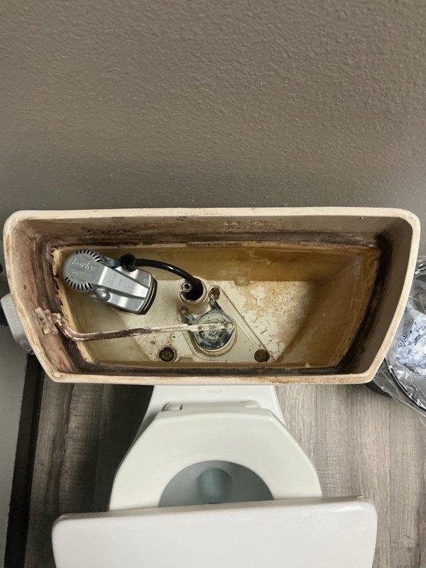 Responded to service call for two toilets experiencing continuous running issues. Upon inspection, first toilet exhibited a torn flapper causing constant water flow, which was replaced to restore proper function. Second toilet was not actively running during visit; however, inspection revealed deteriorating styrofoam insulation inside tank creating debris that likely interfered with flapper seal intermittently. Due to age-related tank deterioration and potential for recurring problems, provided estimate for complete toilet replacement on second unit.
