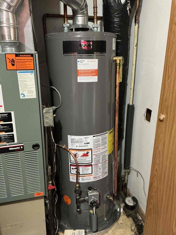 Responded to reported intermittent gas leak in mechanical room affecting furnace system. Previous technicians had isolated leak to area between gas shutoff valve and furnace, with utility company detecting gas presence near burners when unit was not in heating cycle, indicating potential gas valve seating failure. Performed comprehensive leak detection testing using bubble solution on all joints and connections from floor shutoff through water heater and furnace gas train. Identified and tightened loose cap on drip leg that was hand-loose. Conducted extended monitoring of system during operation with no detectable leaks found at time of service. Noted combustion blower exhibiting excessive noise levels, which may indicate impeller wear or bearing failure and could compromise proper venting of combustion gases. Gas valve seating issue remains a concern requiring further diagnostic evaluation and potential valve replacement to ensure safe operation and prevent gas migration to burner ass