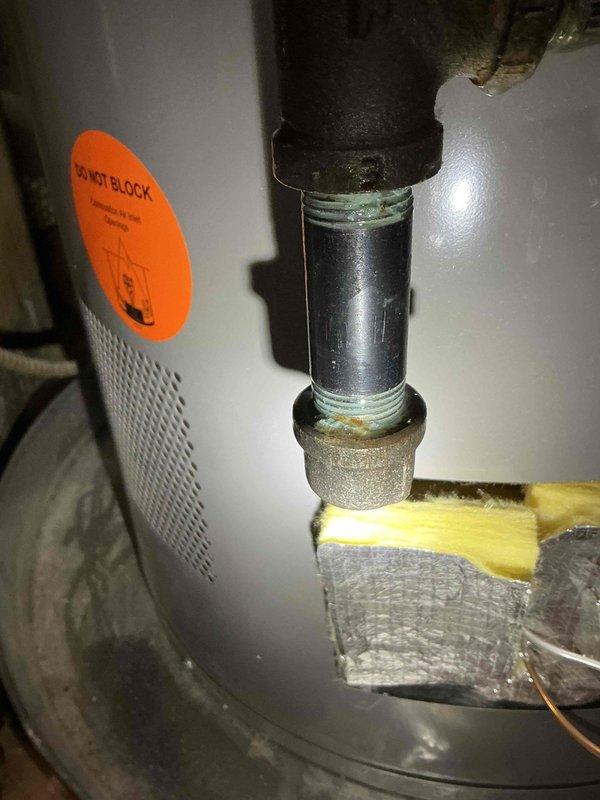 Responded to reported intermittent gas leak in mechanical room affecting furnace system. Previous technicians had isolated leak to area between gas shutoff valve and furnace, with utility company detecting gas presence near burners when unit was not in heating cycle, indicating potential gas valve seating failure. Performed comprehensive leak detection testing using bubble solution on all joints and connections from floor shutoff through water heater and furnace gas train. Identified and tightened loose cap on drip leg that was hand-loose. Conducted extended monitoring of system during operation with no detectable leaks found at time of service. Noted combustion blower exhibiting excessive noise levels, which may indicate impeller wear or bearing failure and could compromise proper venting of combustion gases. Gas valve seating issue remains a concern requiring further diagnostic evaluation and potential valve replacement to ensure safe operation and prevent gas migration to burner ass