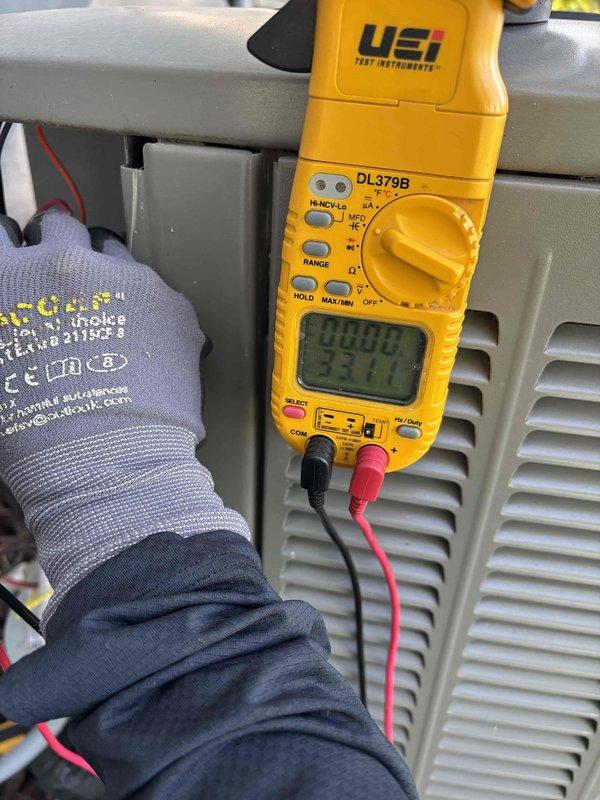 Completed comprehensive maintenance on one furnace and one air conditioning system per agreement. Furnace inspection included filter evaluation, temperature split verification, burner assembly examination, flame sensor check, igniter inspection, motor and capacitor testing, drain line verification, and heat exchanger assessment—all components operating within normal parameters. Unable to perform combustion analysis for CO level verification due to equipment unavailability; follow-up appointment scheduled per homeowner request after declining same-day technician dispatch. Air conditioning maintenance performed with ambient temperature at 68°F, confirming R-410A refrigerant type. Inspection encompassed filter condition, thermostat operation, temperature split measurement, condenser unit evaluation, evaporator and condenser coil inspection, motor and capacitor testing, compressor performance verification, refrigerant charge confirmation, and condensate drain functionality. All AC componen