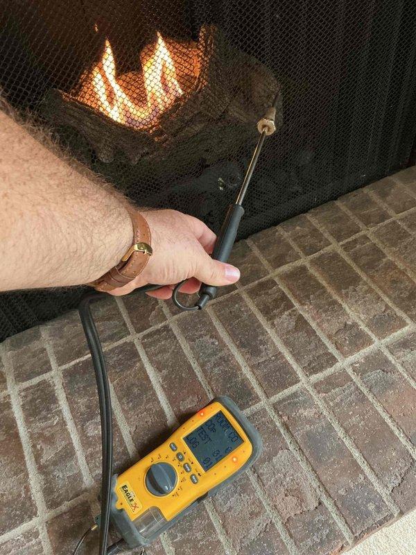Performed follow-up carbon monoxide safety inspection on residential fireplace following recent maintenance service. Conducted comprehensive room CO testing around fireplace shroud and surrounding living area while unit was in operation. Verified proper exhaust draft through chimney and confirmed no carbon monoxide spillage into living space. All safety parameters tested within normal operating range and unit functioning properly.