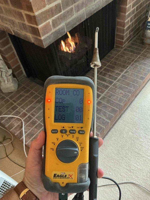Performed follow-up carbon monoxide safety inspection on residential fireplace following recent maintenance service. Conducted comprehensive room CO testing around fireplace shroud and surrounding living area while unit was in operation. Verified proper exhaust draft through chimney and confirmed no carbon monoxide spillage into living space. All safety parameters tested within normal operating range and unit functioning properly.
