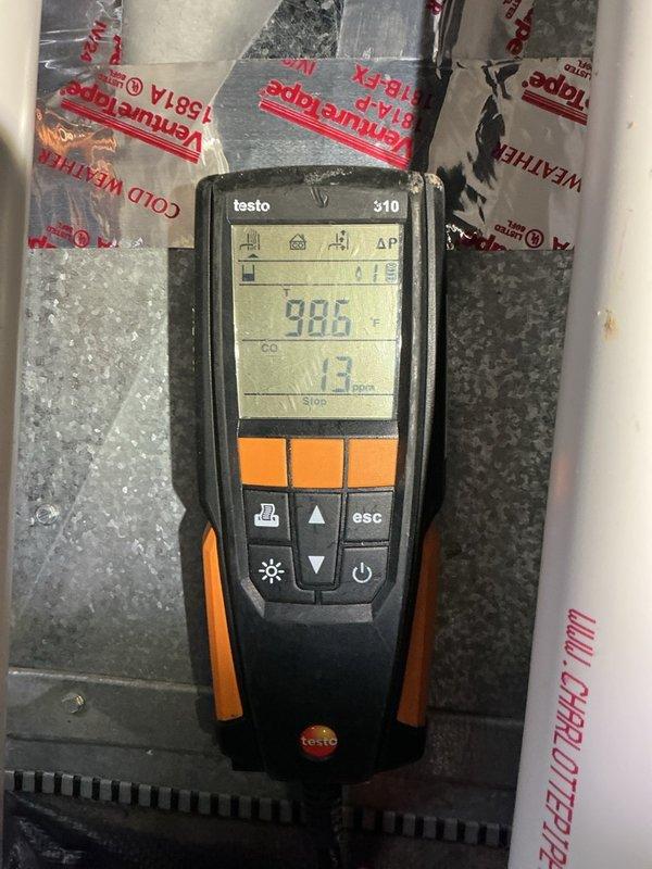 Completed annual heating maintenance on 1-1/2 year old furnace system. Performed comprehensive inspection including heat exchanger examination with no cracks detected, cleaned flame sensor, verified capacitor functionality, and inspected blower motor, inducer motor, and all electrical wiring connections. Flushed condensation pump, replaced air filter with new MANN + HUMMEL unit, and verified proper sealing of exterior piping connections to prevent pest entry. Conducted combustion analysis using Testo 310 analyzer confirming safe operating parameters. System is operating efficiently and prepared for winter heating season.