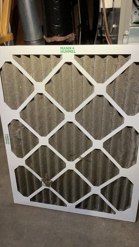 Completed annual heating maintenance on 1-1/2 year old furnace system. Performed comprehensive inspection including heat exchanger examination with no cracks detected, cleaned flame sensor, verified capacitor functionality, and inspected blower motor, inducer motor, and all electrical wiring connections. Flushed condensation pump, replaced air filter with new MANN + HUMMEL unit, and verified proper sealing of exterior piping connections to prevent pest entry. Conducted combustion analysis using Testo 310 analyzer confirming safe operating parameters. System is operating efficiently and prepared for winter heating season.
