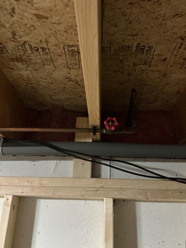 Replaced exterior hose bib with new all-metal unit to restore proper outdoor water access. Installed new shut-off valve on copper supply line in basement to address faulty valve that was not fully closing. All work completed using copper piping per specifications, maintaining existing plumbing system integrity.