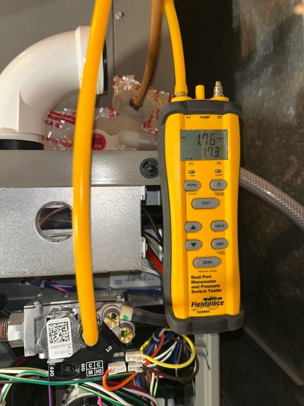 Completed scheduled furnace maintenance including comprehensive system inspection. Cleaned flame sensor, inspected blower wheel, air filtration, inducer motor, gas valve, and heat exchanger with no defects found. Performed combustion analysis confirming 95.6% efficiency with safe carbon monoxide levels, verified proper gas pressure. Cleared condensation drain trap and removed buildup. All components functioning properly with no concerns identified.