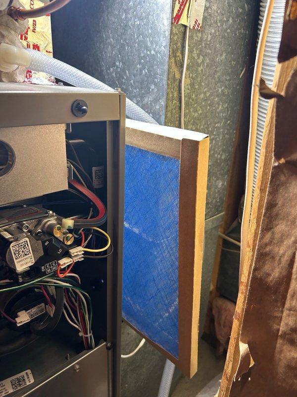 Completed scheduled furnace maintenance including comprehensive system inspection. Cleaned flame sensor, inspected blower wheel, air filtration, inducer motor, gas valve, and heat exchanger with no defects found. Performed combustion analysis confirming 95.6% efficiency with safe carbon monoxide levels, verified proper gas pressure. Cleared condensation drain trap and removed buildup. All components functioning properly with no concerns identified.