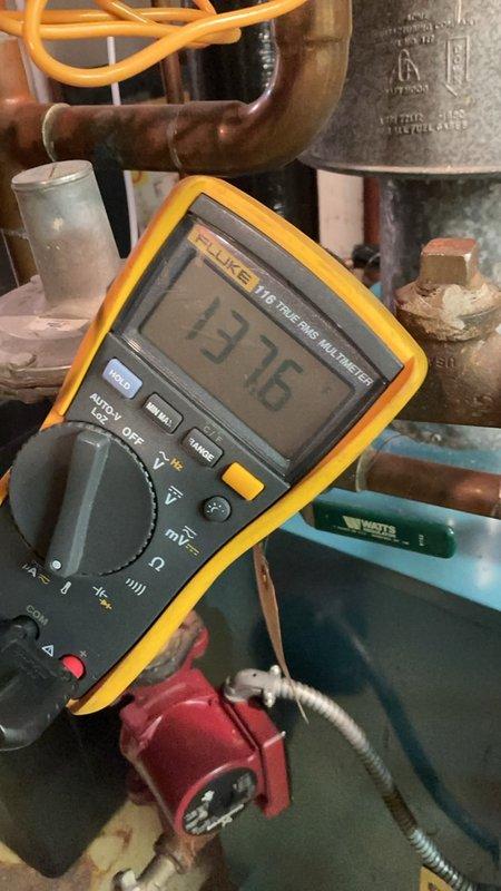 Completed comprehensive boiler tune-up and maintenance service. Thoroughly scrubbed burners, vacuumed debris from under burner assembly and surrounding boiler area. Inspected and verified all five zone valves operating correctly. Performed safety diagnostics including carbon monoxide testing which measured 1 ppm (within safe parameters) and confirmed system pressure at 20 psi. All components functioning properly with no issues identified. System left in optimal operating condition.