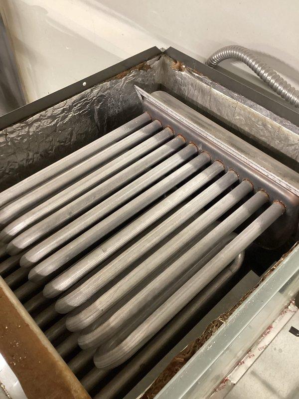 Completed annual fall heating maintenance visit on membership agreement, performing comprehensive tune-ups on three furnaces, one heat recovery ventilator, two humidifiers, two garage furnace units, and three bathroom exhaust fans. All units inspected and serviced with no issues reported; evaporator coils showed normal dust accumulation and were assessed, ductwork and connections verified in good working condition. Preventative maintenance completed per agreement specifications with all equipment operational.