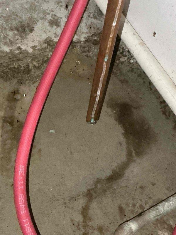 Responded to service call for leaking backflow preventer in mechanical room. Upon inspection, identified failed backflow prevention device on hydronic heating system supply line. Removed defective backflow preventer and installed new replacement unit with proper brass fittings and connections to copper piping. Ensured all connections were properly sealed and torqued to manufacturer specifications. Tested backflow preventer operation and verified proper function with no leaks detected. System returned to normal operation with all circulator pumps functioning correctly.