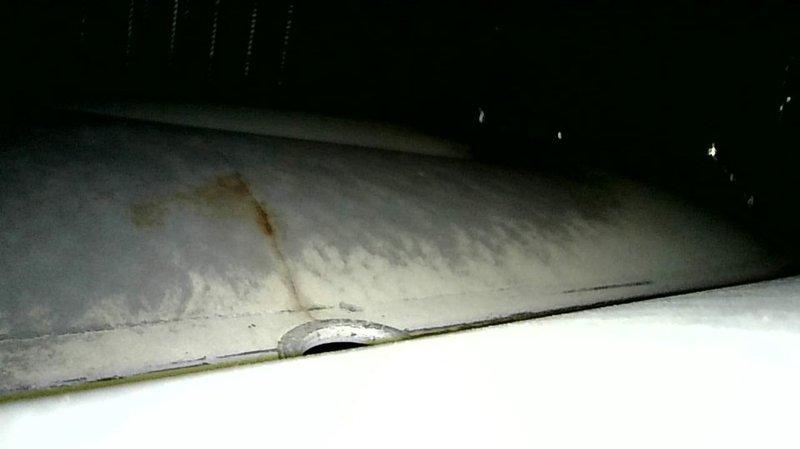 Performed maintenance on a 1997 Heil Blue Stripe furnace and discovered multiple horizontal and vertical cracks in the primary heat-exchanger cells adjacent to the eyelets, which were documented via video camera. Inspection revealed a brittle and deteriorated control board, and the 10 µF run capacitor measured at 8.004 µF, indicating failure. An estimate was prepared for necessary repairs, and replacement furnace options will be provided.
