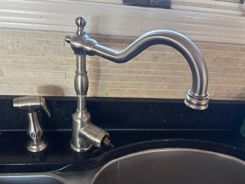 Responded to service call for broken kitchen faucet that had deteriorated due to age and rust, resulting in the fixture separating from the sink. Upon arrival, assessed the damaged faucet and discussed replacement options with homeowner, including nickel-coated spray faucet models. After consultation, homeowner elected to personally source and purchase the replacement faucet. Created installation estimate for customer-supplied fixture and provided guidance on faucet specifications compatible with existing plumbing configuration. Homeowner will schedule installation appointment upon procurement of new faucet.
