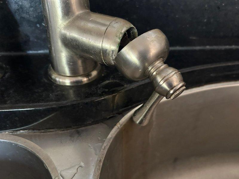 Responded to service call for broken kitchen faucet that had deteriorated due to age and rust, resulting in the fixture separating from the sink. Upon arrival, assessed the damaged faucet and discussed replacement options with homeowner, including nickel-coated spray faucet models. After consultation, homeowner elected to personally source and purchase the replacement faucet. Created installation estimate for customer-supplied fixture and provided guidance on faucet specifications compatible with existing plumbing configuration. Homeowner will schedule installation appointment upon procurement of new faucet.