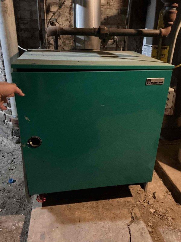 Performed city-required safety inspection and certification on 23-year-old Vaillant boiler system. Conducted comprehensive evaluation including verification of all piping connections for water leaks, system pressure levels, backflow preventer operation, pressure relief valve functionality, and gas valve condition. Cleaned burners, inspected heat exchanger noting minor scaling but confirmed proper operation, verified circulator pump function, and examined heat exchanger seals for integrity with no carbon monoxide leakage detected into living space. Completed full combustion analysis confirming optimal performance parameters. All components operating within manufacturer specifications with no deficiencies identified or repairs recommended at this time.