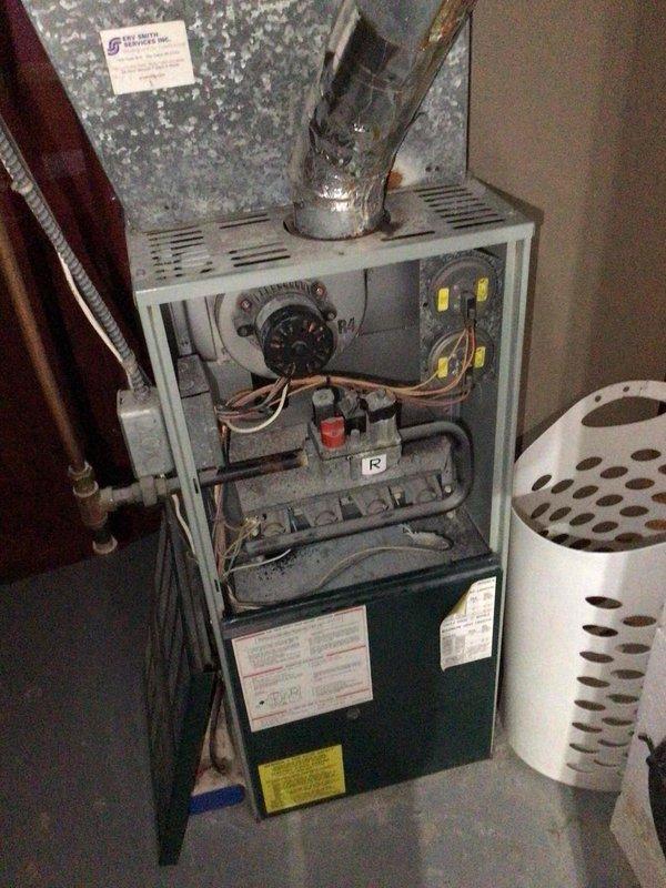 Completed scheduled furnace maintenance on residential heating system. Performed comprehensive inspection including heat exchanger scope examination with no issues found, cleaned flame sensor which tested at 3.5 microamps after service, and verified all electrical components operating within manufacturer specifications with unit functioning properly upon completion.