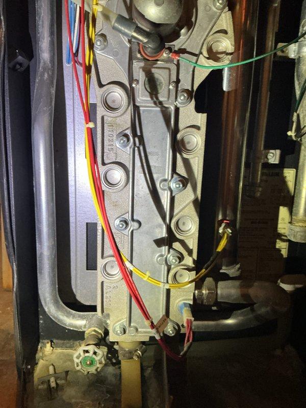 Performed seasonal maintenance on Weil McLain high-efficiency boiler system. Completed thorough cleaning of heat exchanger and inspected burner assembly and all operational components. Identified leaking Venturi valve requiring replacement and documented condition with photos for repair quote processing.