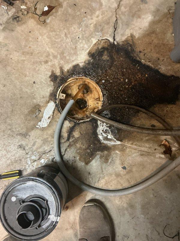 Completed routine water heater flush on 40-gallon natural gas unit manufactured in April 2020 (Model PRQD4QS-38N RH82). During inspection, observed water staining and moisture damage on concrete floor beneath unit, indicating potential leak or discharge from temperature/pressure relief valve. Recommended monitoring for ongoing moisture issues and possible PRV replacement.