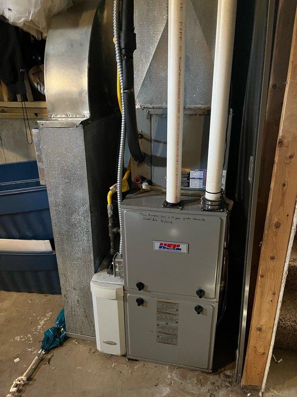 Responded to no heat call and diagnosed faulty gas valve that would not open despite receiving proper voltage from the control board. Performed complete safety inspection with no compromises found. Identified inducer motor producing excessive noise indicating bearing failure, and discovered evidence of condensate leaking into upper furnace cabinet through intake system, which likely caused the original gas valve failure. Provided estimates for inducer motor replacement and in-line drain installation to prevent future condensate issues, with gas valve pricing to follow from parts department. Discussed system's age and overall condition, recommending replacement pricing for comparison against repair costs.