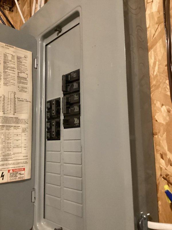 Responded to service call for tankless water heater producing loud chattering noise during hot water operation. Located unit in basement behind laundry room and performed diagnostic assessment. Determined noise was caused by mineral buildup requiring descaling flush. Completed full system flush and descale procedure to eliminate operational noise and restore proper function. Inspected electrical connections and control panel operation. Verified unit operating quietly with normal hot water delivery upon completion.