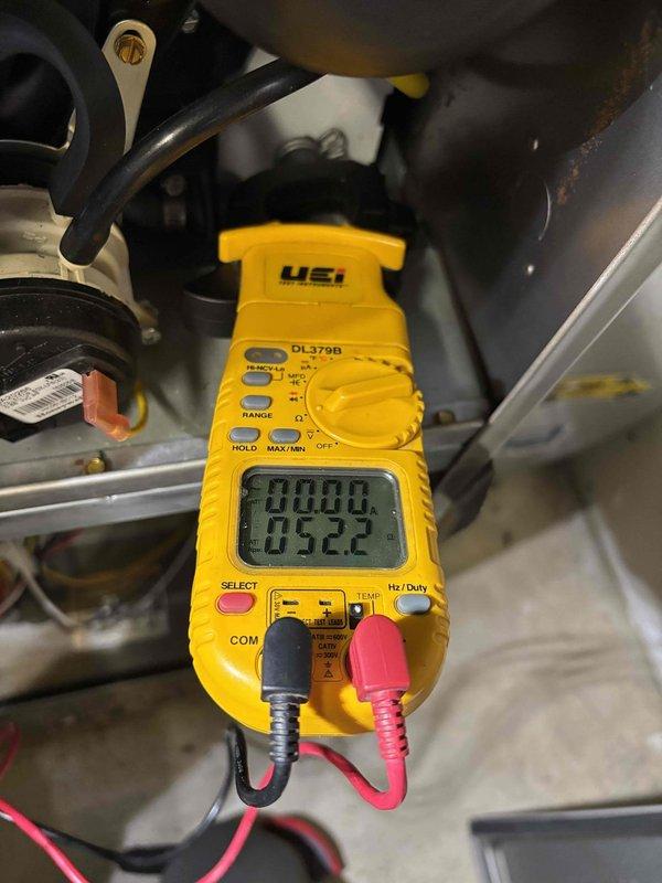 Performed annual heating maintenance on single furnace system. Conducted comprehensive inspection including thermostat operation, air filter condition, condensate drain, blower motor, inducer motor, and electrical wiring—all components functioning properly. Verified temperature split across system within acceptable range. Inspected igniter, flame sensor, and gas pressure readings, all within manufacturer specifications. During heat exchanger inspection, discovered multiple holes in the middle bottom section indicating compromised integrity and potential safety hazard. Immediately red-tagged the unit and shut down gas supply and system operation per safety protocols. Documented findings with photographs showing deterioration of heat exchanger surface. Presented replacement options to property owner, including heat exchanger replacement and full furnace replacement alternatives. Verified active warranty coverage for heat exchanger component. Property owner approved warranty heat exchange