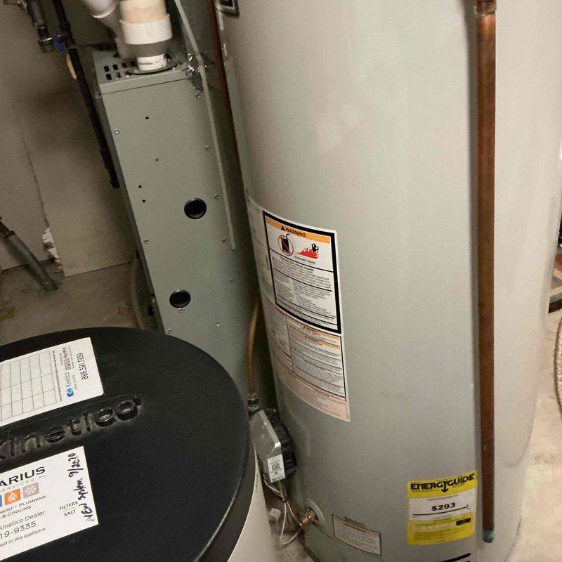 Completed comprehensive seasonal tune-up on 8-year-old American Standard HVAC system including both furnace and air conditioning components. Performed thorough inspection of furnace revealing heat exchanger clean and free of rust or cracks, cleaned flame rod, verified blower motor and inducer motor amp draws within specifications, confirmed hot surface igniter ohm reading within acceptable range, and measured carbon monoxide at safe level of 7ppm. Identified inducer capacitor reading slightly below manufacturer specifications and replaced with new capacitor to ensure optimal performance. Inspected air conditioning system including component box, confirmed outdoor coils clean and free of debris, verified all wiring intact without damage, tested capacitor and contactor with readings within normal range, and measured temperature differential at 18 degrees indicating proper refrigerant charge and system operation. Both heating and cooling systems operating efficiently with all components f
