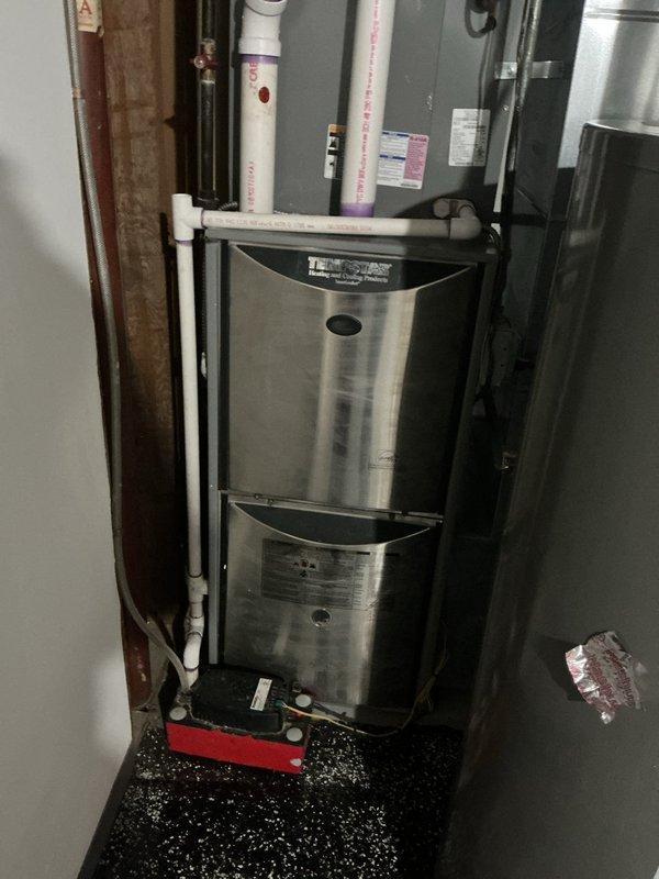 Responded to no heat call on 16-year-old furnace system. Upon inspection, diagnosed failed gas valve preventing ignition. Further evaluation revealed heat exchanger exhibiting severe temperature stress points, extensive rust, and corrosion throughout, creating potential safety concerns. Inducer draft motor showing signs of failure with abnormal operation. Due to multiple critical component failures and age of unit, recommended full system replacement rather than repairs. Documented conditions with photographs and scheduled furnace replacement estimate.