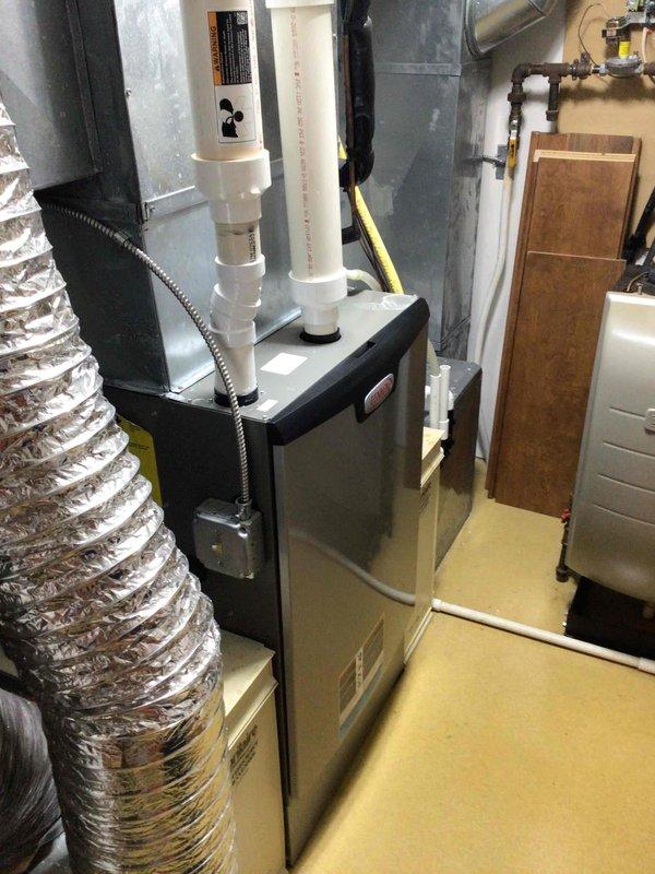 Completed annual tuneup on both air conditioning and furnace systems. Performed comprehensive inspection of Lennox outdoor condenser unit and indoor furnace with condensate pump assembly. Verified all electrical components on both systems tested within manufacturer specifications. Confirmed air filters were clean and both units operating properly at time of service.